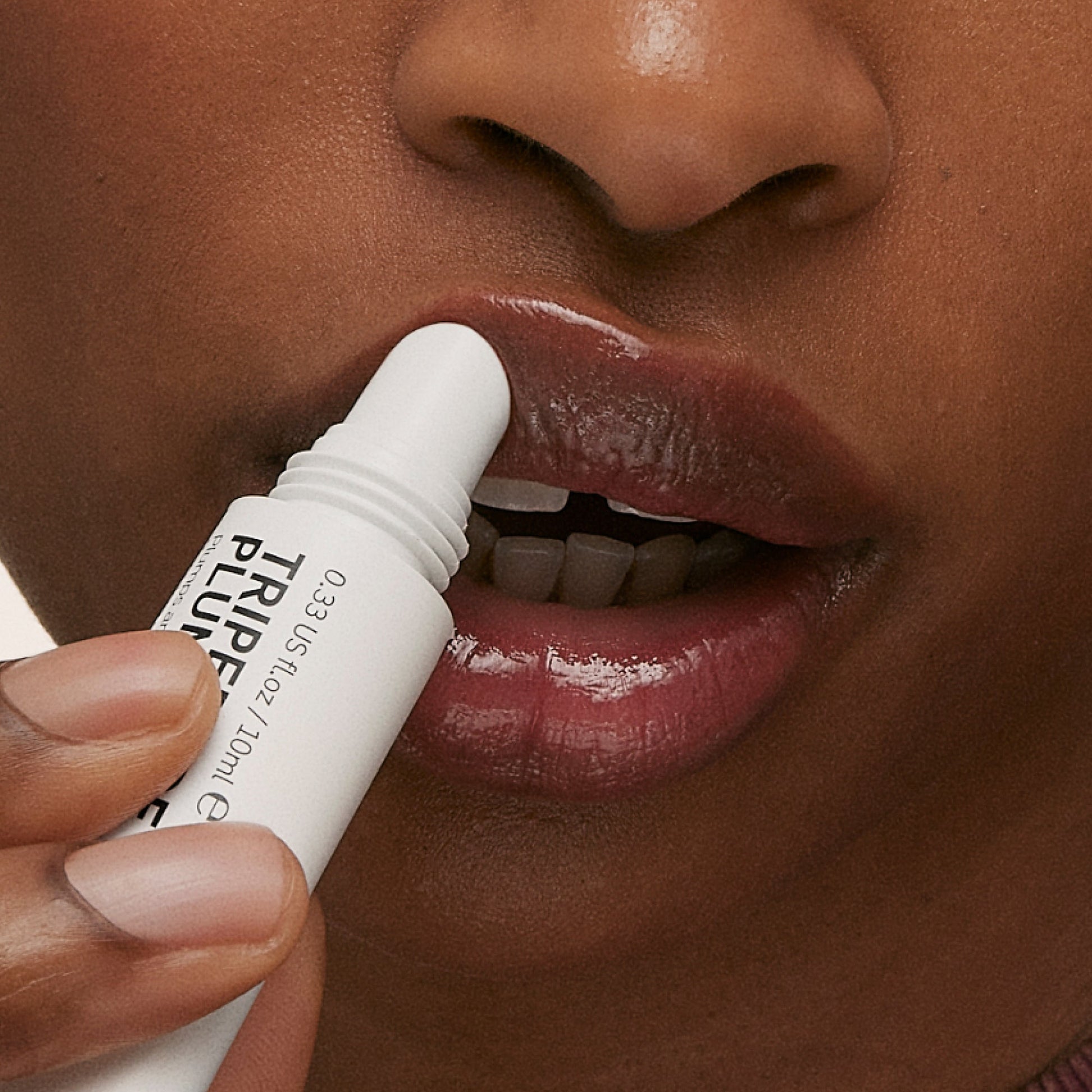 tripeptide-plumping-berry-lip-balm-b0 ApplicationBerry.jpg